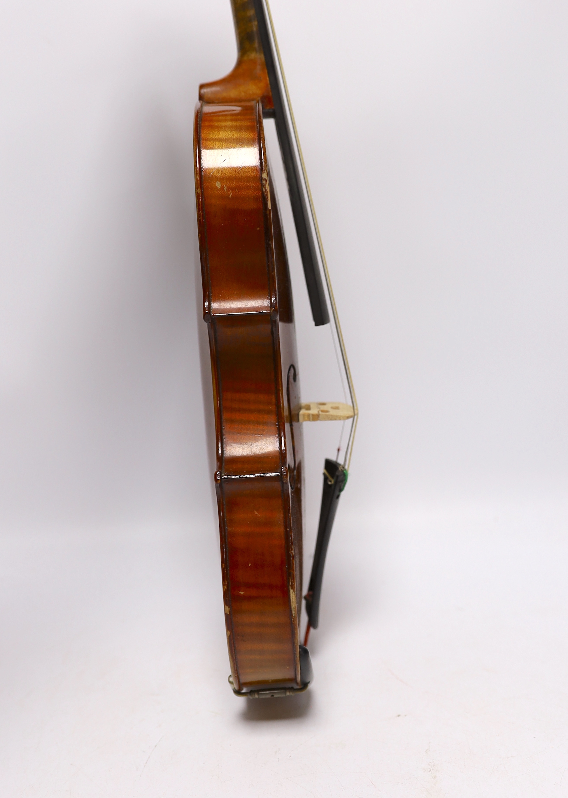 A cased 3/4 sized student violin marked Dresden, with reproduction Stradivarius label